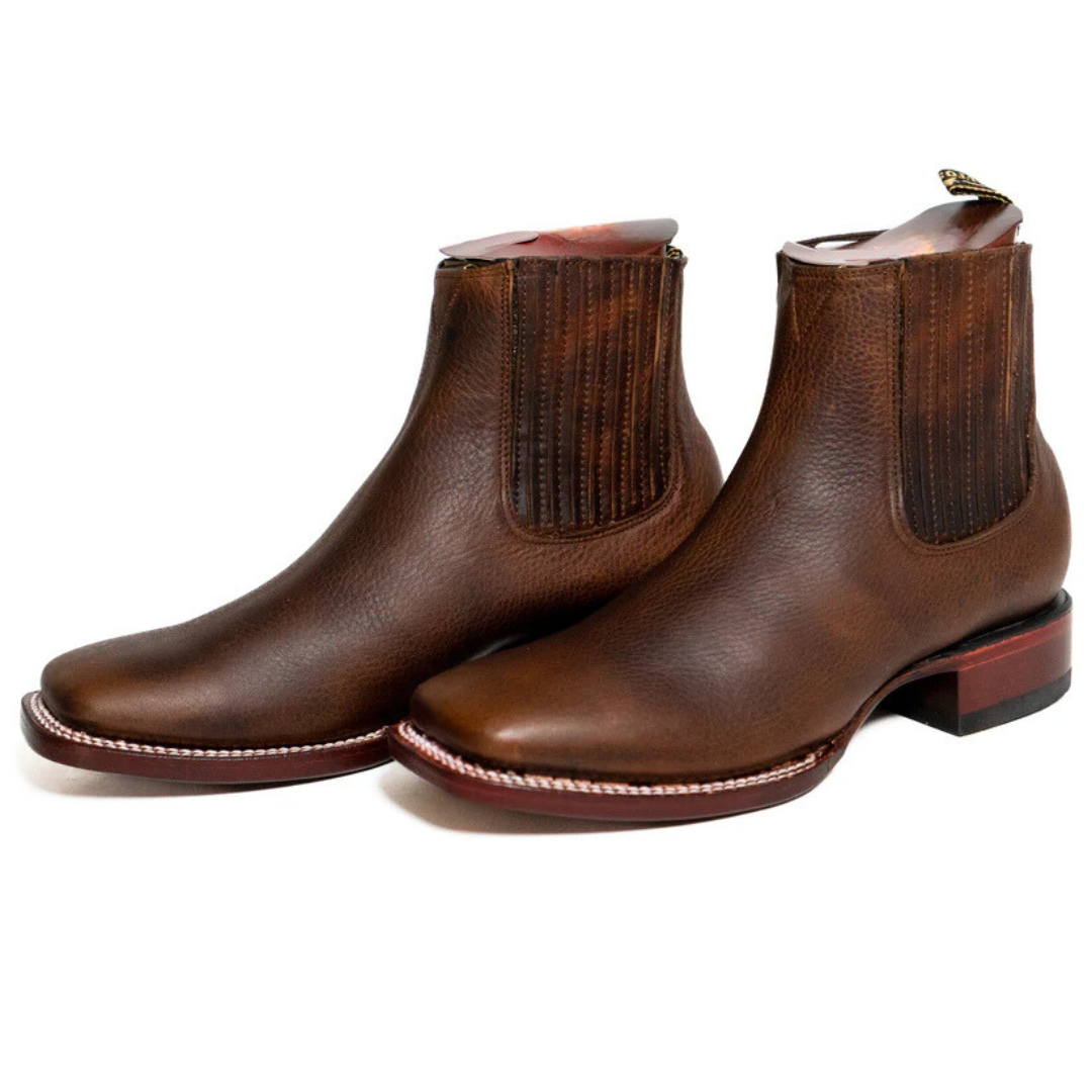 Elegantes botas de cuero para hombre
